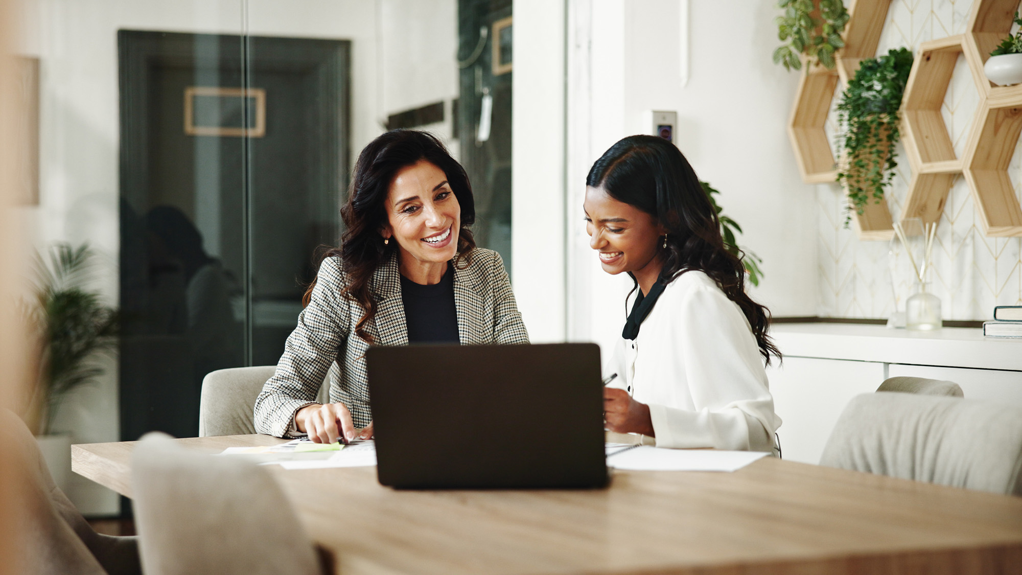 Meeting, business people with laptop in office, discussing projects